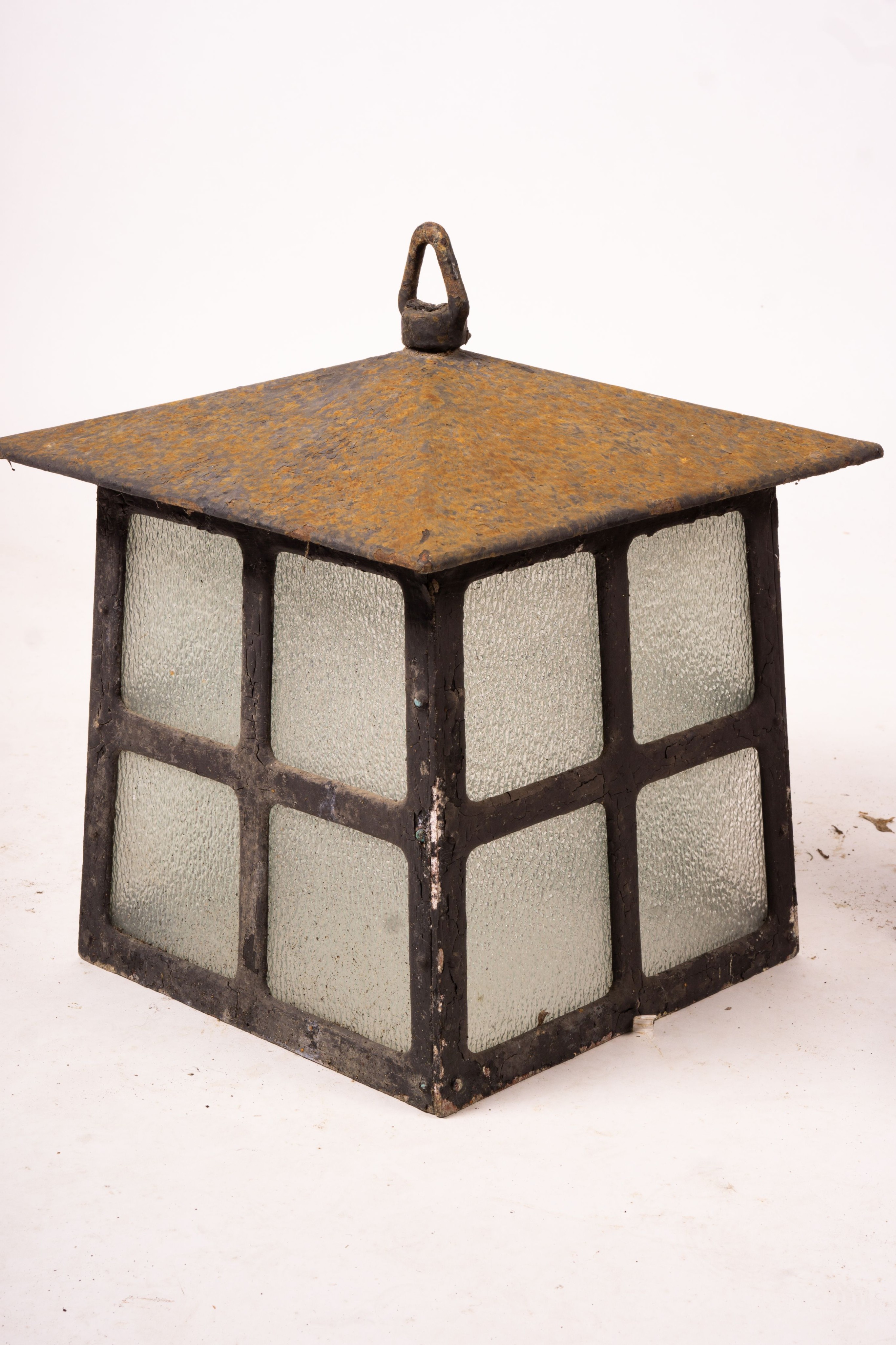 A Victorian style lantern on cast iron base, height 143cm together with a pair of lanterns and a pair of fire dogs